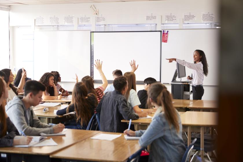 Teens ask questions in class